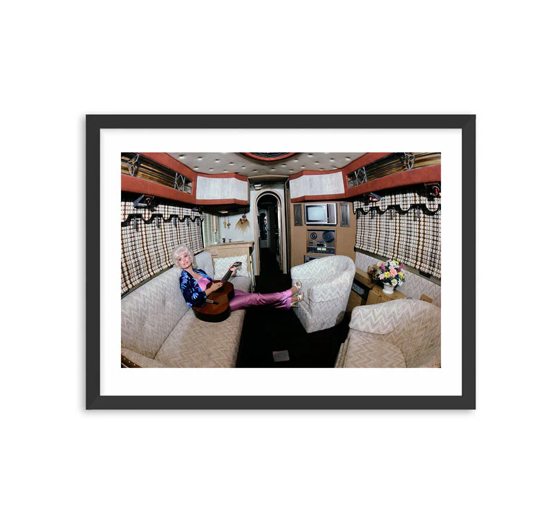 Framed Dolly Parton Sitting on Tour Bus Print